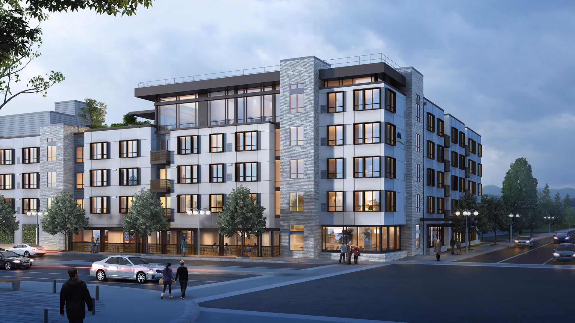 Modern multi-story senior living building at dusk with illuminated windows, street traffic, and pedestrians.